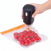 FreshVault vacuum sealer shown with compatible vacuum seal bags